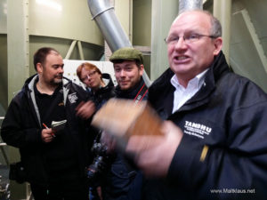 Distillery manager Sandy demonstrating the old grist shaking box
